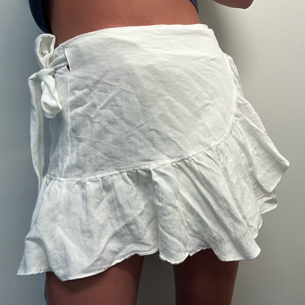 Polly white ruffled cross over skirt